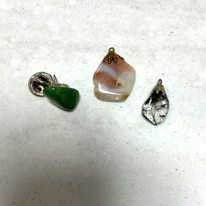 Rock charms and pin.